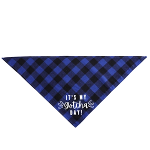 Close-up of blue buffalo plaid pet bandana with white It's My Gotcha Day print