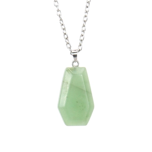 Detail of faceted green aventurine coffin-shaped pendant on a silver-tone chain necklace