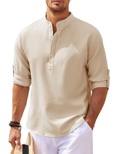 Detail view of beige waffle knit texture on men's long sleeve henley shirt fabric