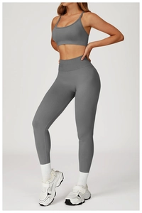 Side view of dark gray seamless yoga set with sports bra and high-waist leggings
