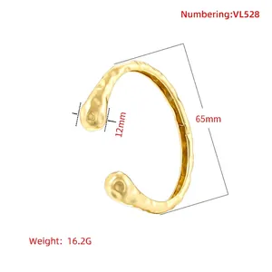 18K gold plated hammered texture open cuff bracelet with spherical ends and lava design