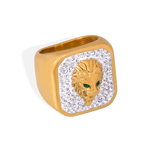 Hip hop style gold lion head ring with emerald eyes and pave white crystals