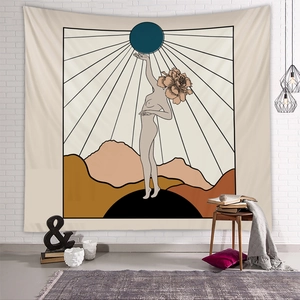 Detail of bohemian wall tapestry featuring a floral surrealist portrait on a brick wall