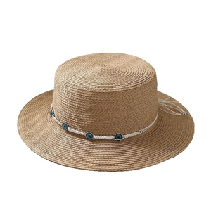 Classic straw boater hat in khaki with evil eye charm band for summer beach sun protection