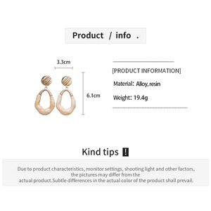Detailed product specs of oval resin earrings with 6.1cm height and 3.3cm width dimensions