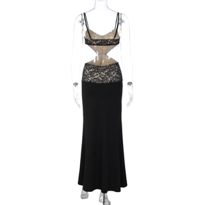 Détail de la robe moulante noire avec broderie dentelle florale et découpes à la taille
