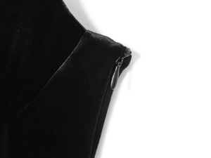 Detail of invisible zipper closure on black velvet bodysuit with premium sewing finish