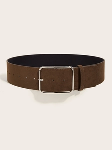 Detailed view of deep brown suede wide belt with polished silver square metal buckle