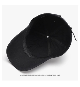 Detail view showing internal reinforced structure and cotton sweatband of the black baseball cap