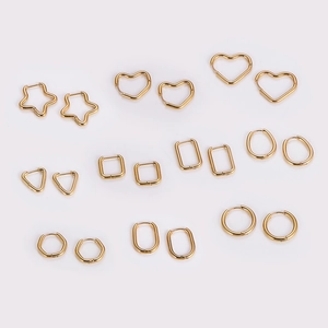 Minimalist gold geometric earring set featuring stars, hearts, and squares in shiny metal