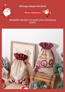 Detail of burlap Christmas gift bags with red plaid drawstring and reindeer snowflake prints