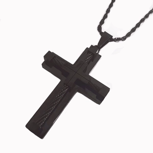 Retro black stainless steel cross pendant necklace with woven texture on white background