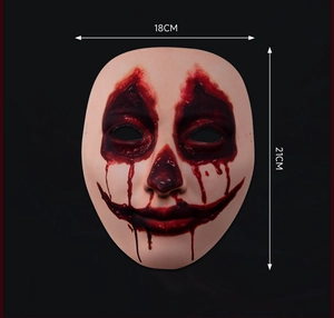 Creepy clown mask with blood stains for Halloween, dimensions 18cm by 21cm detailed view