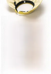 Detail of yellow shell hat showing wide brim, sweatband and foldable headband function