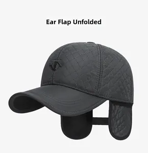Detail view of winter baseball cap with unfolded earflaps and quilted windproof fabric