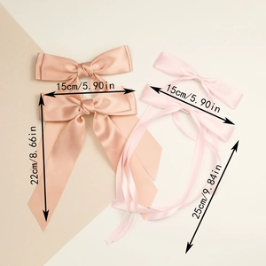 Detailed dimension guide for polyester bow hair clips with long streamers in soft pink