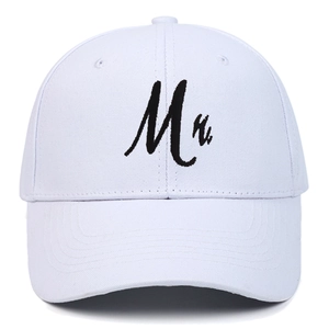 Close-up of white cotton baseball cap featuring black embroidered Mr. lettering on front