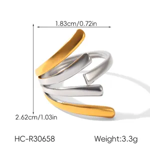Detailed view of two-tone spiral open ring with specific dimensions and weight details