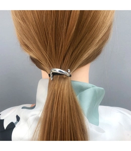 Silver alloy hair clip with curved design shown on a ponytail for street fashion style
