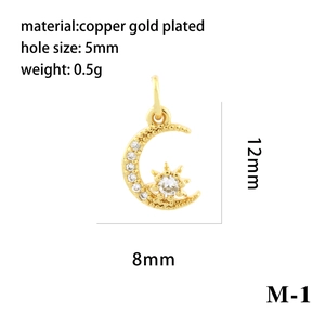Detail of 12x8mm 18K gold plated crescent moon and star pendant with crystal stones