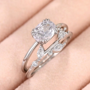 Set de anillos de plata con piedra ovalada y banda de circonita en forma de hoja