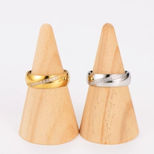 Cross-over irregular stainless steel rings with sparkling cubic zirconia in gold and silver