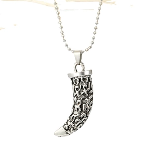 Vintage punk wolf tooth pendant necklace in antique silver with tribal embossed patterns