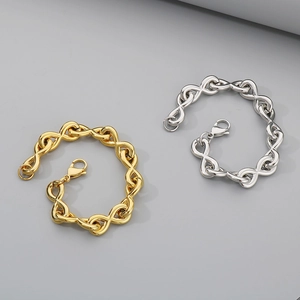 Detail view of infinity link bracelets in gold and silver finish with lobster clasp