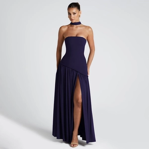 Detail of elegant dark purple strapless dress featuring high slit and matching neck scarf