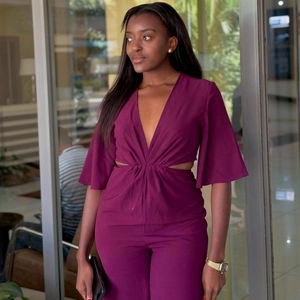 Women's deep V-neck plum cutout jumpsuit with flared sleeves and slim fit design