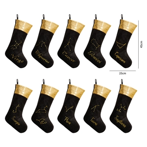 Set of 10 black Christmas stockings with golden sequins and embroidered constellations