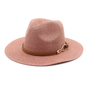 Detail of woven straw fedora featuring a brown leather band and metallic buckle