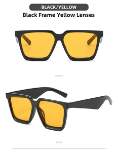 Detail view of square black frame sunglasses with vibrant yellow lenses and wide temples