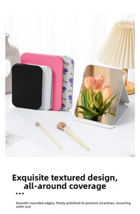 Foldable desktop makeup mirror featuring faux leather cover with tulip floral patterns