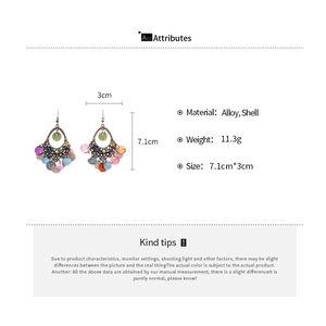 Detailed size and material specifications for bohemian drop earrings with shell discs