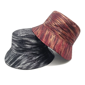 Retro hip-hop bucket hats in black silver and bronze metallic wood grain texture