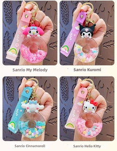 Detail view of Sanrio donut liquid charms featuring Melody, Kuromi, Cinnamoroll and Hello Kitty