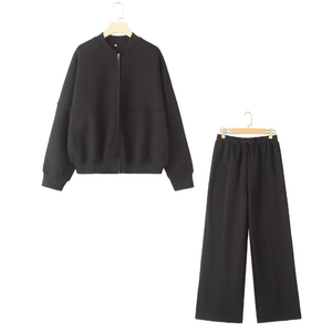 Women's black zip-up bomber jacket and high-waisted wide-leg sweatpants set