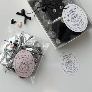 Elegant silver hair scrunchie and plush doll gift set with a Happy Birthday greeting card