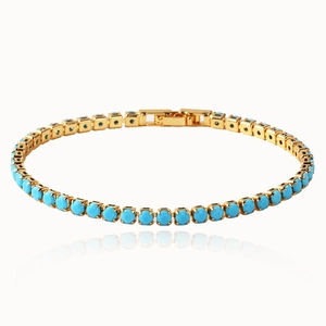 Elegant gold tennis bracelet featuring round green zircon stones in a circular display
