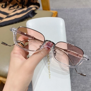 Fashionable translucent square sunglasses with light brown lenses and silver accents
