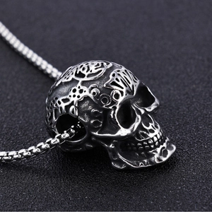 Gothic punk carved skull pendant in antique silver finish with detailed hollow craftsmanship