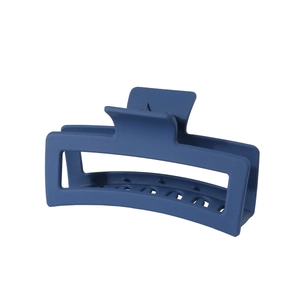 Close-up of a matte dark blue oversized 13cm rectangular hollow hair claw clip
