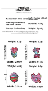 Detailed size specifications for pink heart and dagger enamel pins on white background