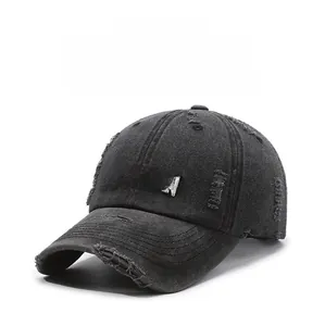 Detail of BOSTON 3D embroidery and distressed ripped texture on gray vintage baseball cap