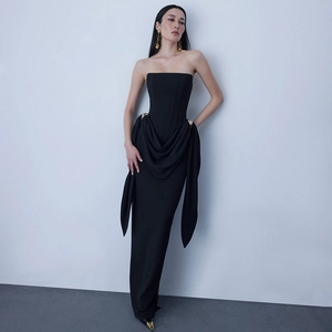 Elegant black strapless evening maxi dress with corset bodice and waist draping detail