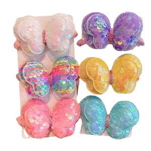 Set of 6 colorful sequin butterfly hair ties for girls on white display card