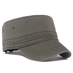 Detail of army green cadet cap showing washed cotton texture and metal side eyelets