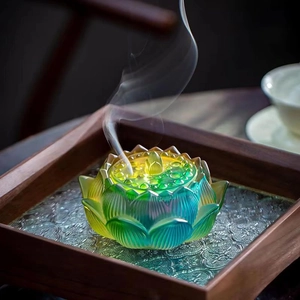 Lotus incense burner with gradient glass texture and rising smoke on wooden tray