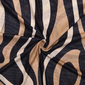 Detailed close-up of wavy print mesh fabric showing sheer texture and drape of the dress